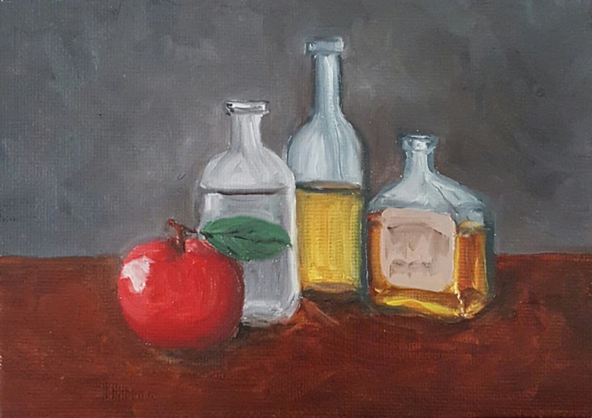 Bottles and apple