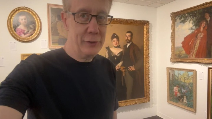 Andrew among the paintings at the ArtLove Salon