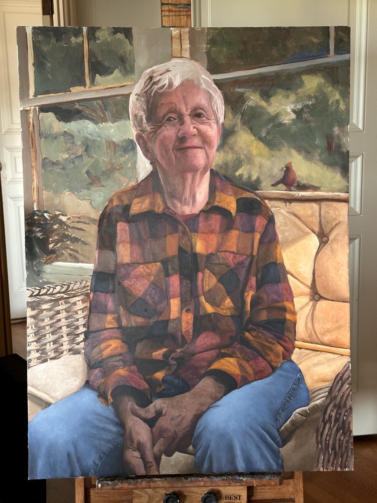 The portrait of Reva in progress on the easel, the background still loose.